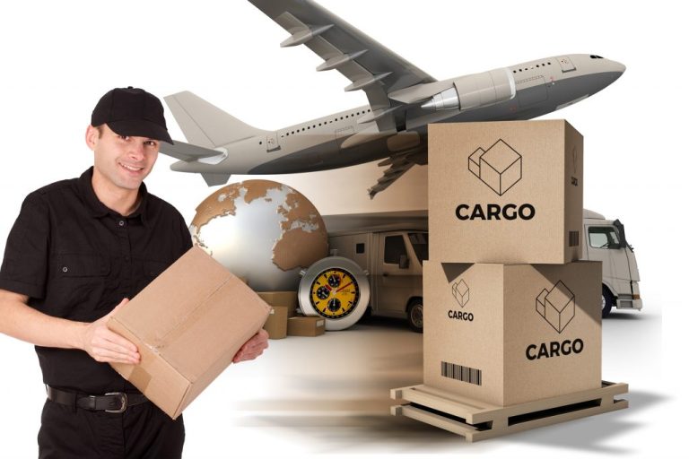 Couriers carrying a box in front of an aeroplane, truck and pallet of boxes.