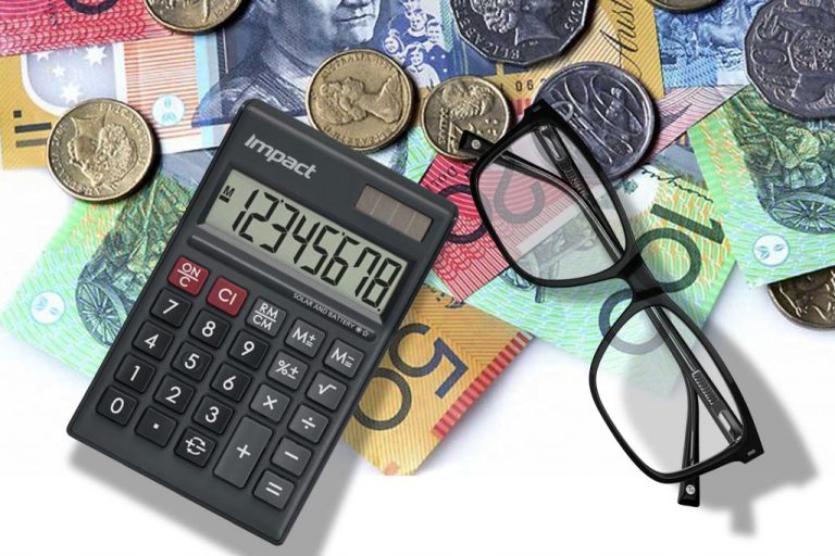 Money and a calculator symbolising the cost of promotional products.